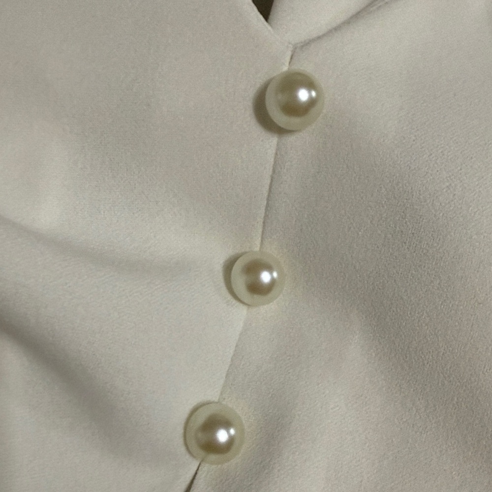 Elegant Cream Blouse with Pearl Buttons